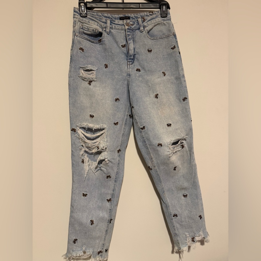Distressed Light Blue Jeans with Embroidered Butterflies